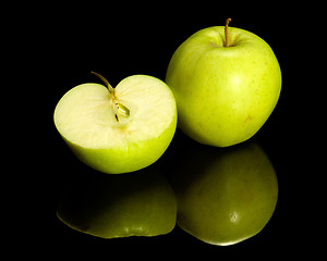 Image showing apple on reflective ground