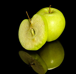 Image showing apple on reflective ground