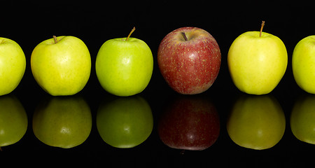 Image showing apples in a row