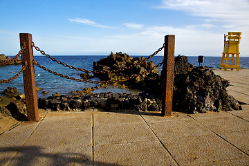 Image showing yellow lifeguard chair cabin  in spain  lanzarote  rock stoner  