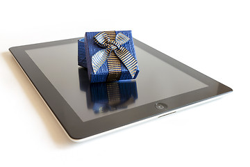 Image showing Digital tablet with christmas present