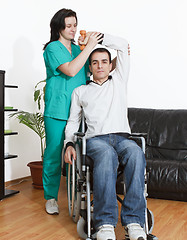 Image showing Physical therapist working with patient