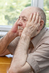 Image showing senior man thinking