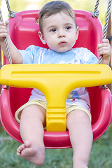 Image showing baby boy in swing