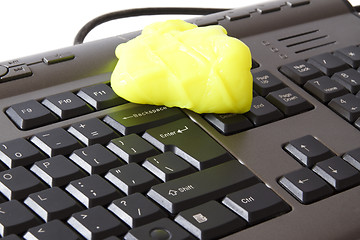 Image showing cleaning the keybord with special sponge