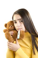 Image showing sick girl measures the temperature