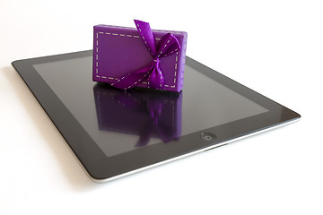 Image showing Digital tablet with christmas present