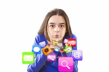 Image showing Teenage girl blowing app icons from digital tablet