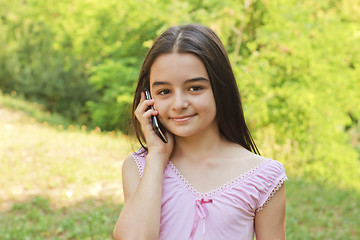 Image showing Teenage girl with smartphone