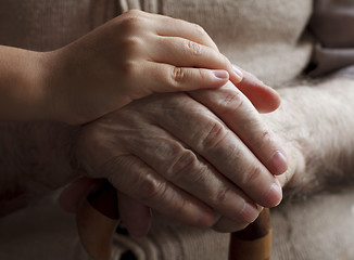 Image showing grandfather and granddaughter hands