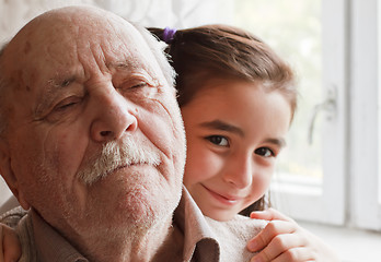 Image showing Grandfather and granddaughter