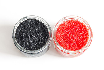 Image showing red and black caviar in glass jars