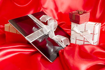 Image showing Digital tablet with christmas present