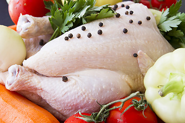 Image showing Raw chicken with vegetables