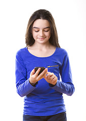 Image showing Teenage girl with smartphone