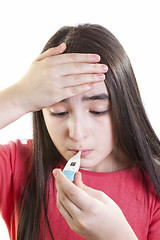 Image showing ill girl child with thermometer