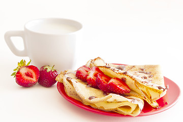 Image showing sweet pancakes with strawberry and cup of milk