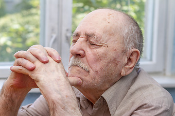 Image showing senior man thinking