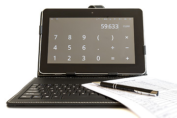 Image showing Calculating on digital tablet computer