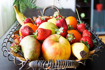 Image showing fruits basket in living room