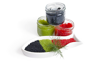 Image showing CAVIAR IN THE OPEN GLASS CONTAINERS