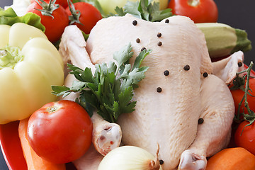 Image showing Raw chicken with vegetables