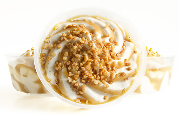 Image showing vanilla ice cream with caramel topping