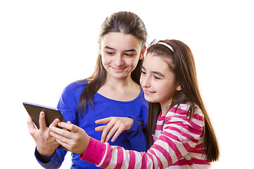 Image showing Happy teen girls with digital tablet 