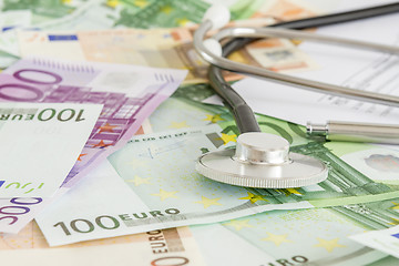 Image showing Money and stethoscope, medical insurance