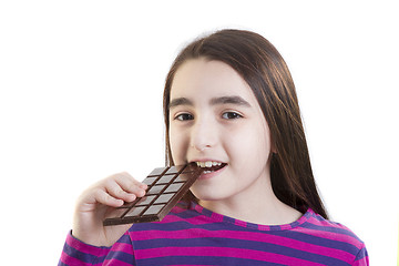 Image showing Young girl eating chocolate