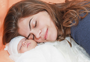 Image showing  young mother with new born baby.