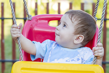 Image showing baby boy in swing