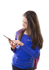 Image showing Teenager girl with backpack with digital tablet