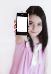 Image showing Little girl with modern touch white screen phone