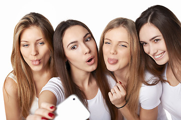 Image showing Girls making self portrait with a smartphone