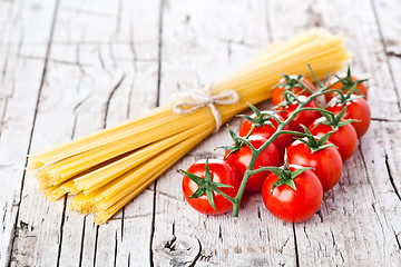 Image showing uncooked pasta and fresh tomatoes