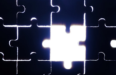 Image showing Wooden puzzle and backlight background