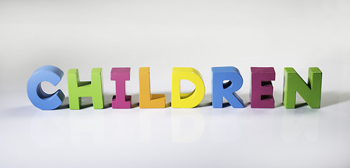 Image showing Multicolored text children made of wood.