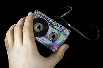 Image showing Hand holding vintage cassette tape