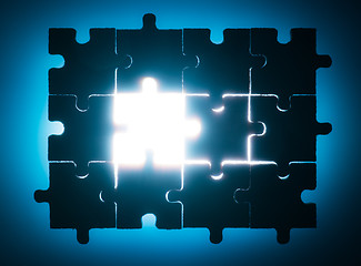 Image showing Wooden puzzle and backlight background