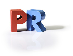 Image showing Multicolored word PR made of wood.