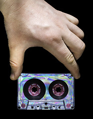 Image showing Hand holding vintage cassette tape