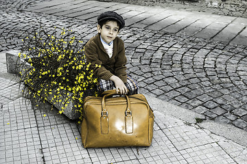 Image showing Child on a road with vintage bag
