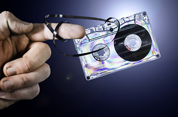 Image showing Hand holding vintage cassette tape