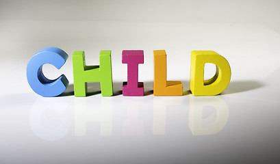 Image showing Multicolored text child made of wood.