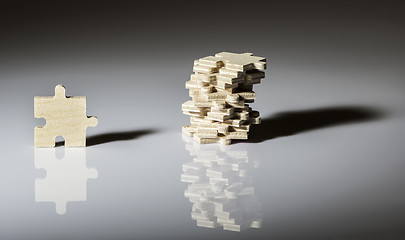 Image showing Wooden puzzle on white background. 