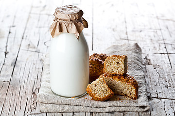 Image showing bottle of milk and fresh baked bread 