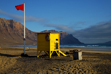 Image showing lifeguard chair red flag in spain   pond  coastline and summer 