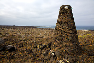 Image showing tower spain  hill      black rocks   the   lanzarote 