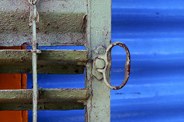 Image showing metal venetian blind and a blue   in la boca buenos aires 